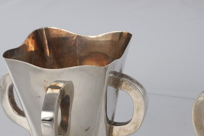 Lot 205 - A PAIR OF SCOTTISH SILVER ART AND CRAFTS VASES