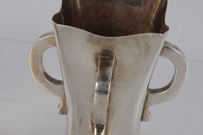 Lot 205 - A PAIR OF SCOTTISH SILVER ART AND CRAFTS VASES