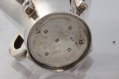 Lot 205 - A PAIR OF SCOTTISH SILVER ART AND CRAFTS VASES