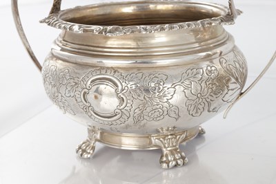 Lot 296 - A GEORGE IV THREE PIECE SILVER TEA SET