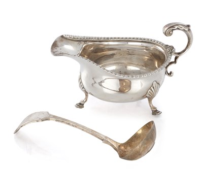 Lot 222 - A GEORGIAN SILVER SAUCEBOAT AND PLATED LADLE