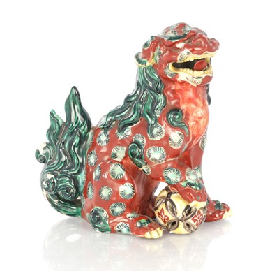 Lot 431 - A CHINESE CERAMIC FOO DOG SCULPTURE