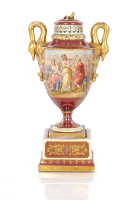 Lot 78 - A 19TH CENTURY VIENNA PORCELAIN TWO HANDLED LIDDED URN SHAPED VASE ON PEDESTAL