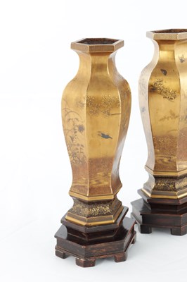 Lot A FINE PAIR OF JAPANESE MEIJI PERIOD GOLD LACQUERWORK CABINET VASES ON HARDWOOD STANDS