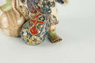 Lot 673 - A JAPANESE MEIJI PERIOD SATSUMA FIGURE OF THE LUCKY GOD DAIKOKU