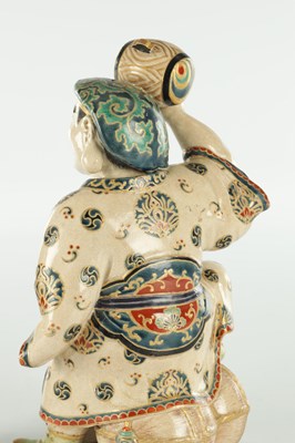 Lot 673 - A JAPANESE MEIJI PERIOD SATSUMA FIGURE OF THE LUCKY GOD DAIKOKU