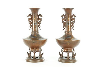 Lot 589 - A FINE PAIR OF JAPANESE MEIJI PERIOD BRONZE AND MIXED METAL FOOTED VASES