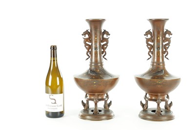 Lot 589 - A FINE PAIR OF JAPANESE MEIJI PERIOD BRONZE AND MIXED METAL FOOTED VASES