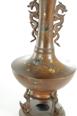 Lot 589 - A FINE PAIR OF JAPANESE MEIJI PERIOD BRONZE AND MIXED METAL FOOTED VASES