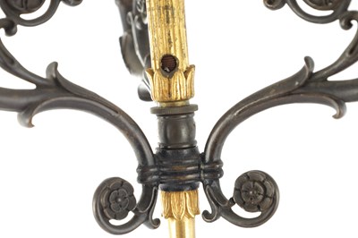 Lot 932 - A PAIR OF 19TH CENTURY FRENCH BRONZE AND GILT BRONZE FOUR BRANCH FIGURAL CANDELABRA