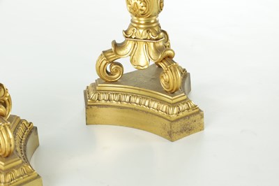 Lot 911 - A PAIR OF 19TH CENTURY REGENCY STYLE BRONZE AND GILT BRONZE THREE BRANCH CANDELARBRA
