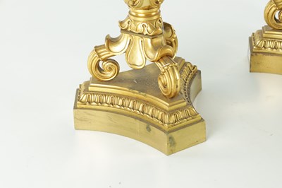 Lot 911 - A PAIR OF 19TH CENTURY REGENCY STYLE BRONZE AND GILT BRONZE THREE BRANCH CANDELARBRA