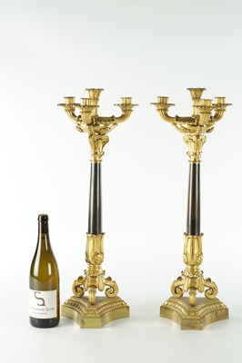 Lot 911 - A PAIR OF 19TH CENTURY REGENCY STYLE BRONZE AND GILT BRONZE THREE BRANCH CANDELARBRA
