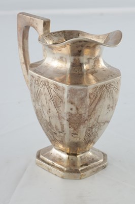Lot 675 - A CHINESE SILVER FOUR PIECE TEA SERVICE