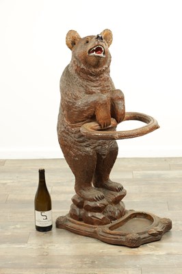 Lot 951 - A LATE 19TH CENTURY CARVED BLACK FOREST BEAR STICK STAND