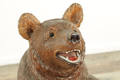Lot 951 - A LATE 19TH CENTURY CARVED BLACK FOREST BEAR STICK STAND