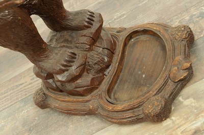 Lot 951 - A LATE 19TH CENTURY CARVED BLACK FOREST BEAR STICK STAND