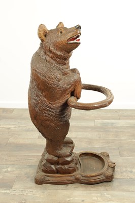 Lot 951 - A LATE 19TH CENTURY CARVED BLACK FOREST BEAR STICK STAND