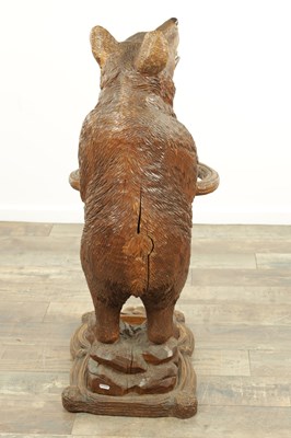 Lot 951 - A LATE 19TH CENTURY CARVED BLACK FOREST BEAR STICK STAND