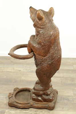 Lot 951 - A LATE 19TH CENTURY CARVED BLACK FOREST BEAR STICK STAND