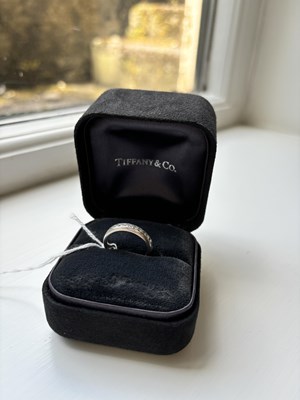 Lot 143 - A TIFFANY & CO LUCIDA PLATINUM ETERNITY RING