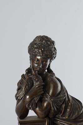 Lot A LATE 19TH CENTURY FRENCH BRONZE, ORMOLU AND ROUGE MARBLE CLOCK GARNITURE