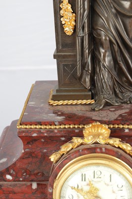Lot A LATE 19TH CENTURY FRENCH BRONZE, ORMOLU AND ROUGE MARBLE CLOCK GARNITURE