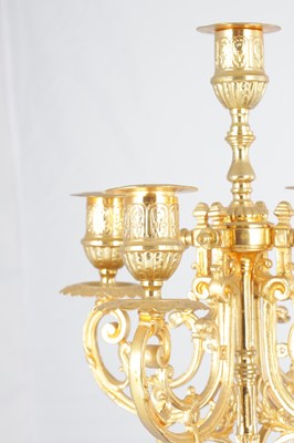 Lot A LATE 19TH CENTURY FRENCH BRONZE, ORMOLU AND ROUGE MARBLE CLOCK GARNITURE