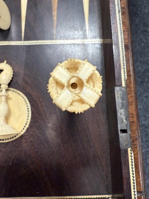 Lot 375 - AN EARLY 19TH CENTURY VIZAGAPATAM INDIAN ROSEWOOD AND IVORY GAMES COMPENDIUM
