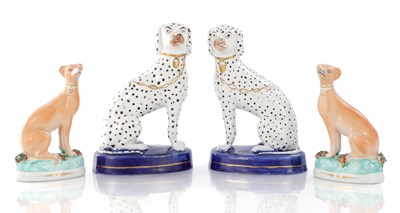 Lot 28 - TWO PAIRS OF 19TH CENTURY STAFFORDSHIRE DOGS
