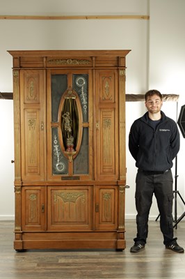 Lot 1021 - A LARGE LATE 19TH CENTURY UPRIGHT COIN OPERATED BARREL PIANO