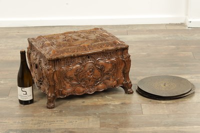 Lot 1042 - A LATE 19TH CENTURY GERMAN CARVED OAK SYMPHONION MUSIC BOX