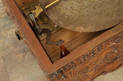 Lot 1042 - A LATE 19TH CENTURY GERMAN CARVED OAK SYMPHONION MUSIC BOX