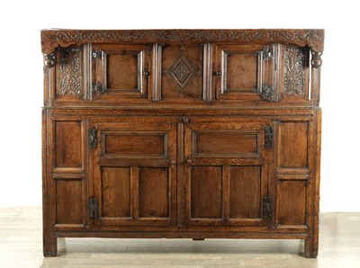 Lot 1698 - A 17TH CENTURY CARVED OAK DUDARN / COURT CUPBOARD
