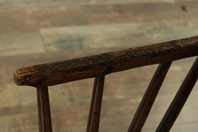Lot 1639 - A RARE 18TH CENTURY CHILDS WALNUT AND ELM PRIMITIVE WELSH STICK BACK CHAIR