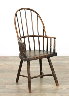 Lot 1726 - AN EARLY 19TH CENTURY ASH AND ELM STICK BACK PRIMITIVE WELSH WINDSOR CHAIR