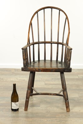 Lot 1726 - AN EARLY 19TH CENTURY ASH AND ELM STICK BACK PRIMITIVE WELSH WINDSOR CHAIR