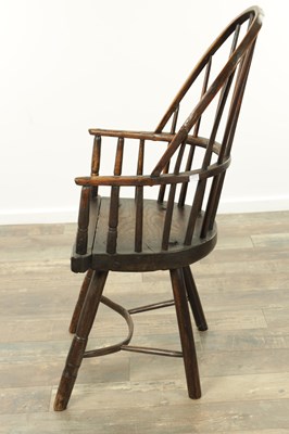 Lot 1726 - AN EARLY 19TH CENTURY ASH AND ELM STICK BACK PRIMITIVE WELSH WINDSOR CHAIR