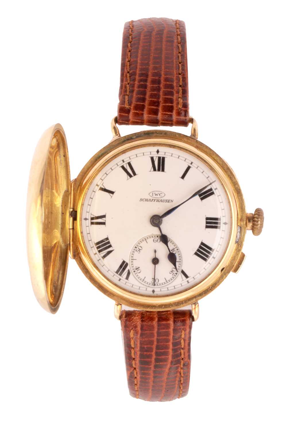 Lot 1303 - IWC SCHAFFHAUSEN AN EARLY 20TH CENTURY HALF HUNTER 18CT GOLD WRIST WATCH