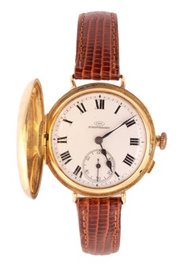 Lot 1303 - IWC SCHAFFHAUSEN AN EARLY 20TH CENTURY HALF HUNTER 18CT GOLD WRIST WATCH