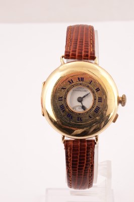 Lot 1303 - IWC SCHAFFHAUSEN AN EARLY 20TH CENTURY HALF HUNTER 18CT GOLD WRIST WATCH