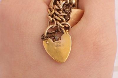 Lot 106 - A 9CT GOLD CHARM BRACELET WITH SOVEREIGN