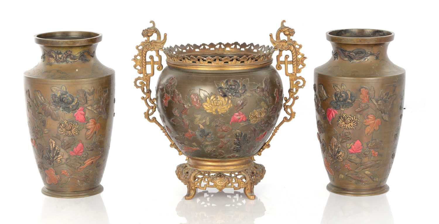 Lot 595 - A JAPANESE MEIJI PERIOD BRONZE AND MIXED METAL GARNITURE