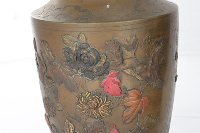 Lot 595 - A JAPANESE MEIJI PERIOD BRONZE AND MIXED METAL GARNITURE