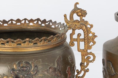 Lot 595 - A JAPANESE MEIJI PERIOD BRONZE AND MIXED METAL GARNITURE