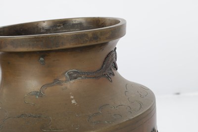 Lot 595 - A JAPANESE MEIJI PERIOD BRONZE AND MIXED METAL GARNITURE