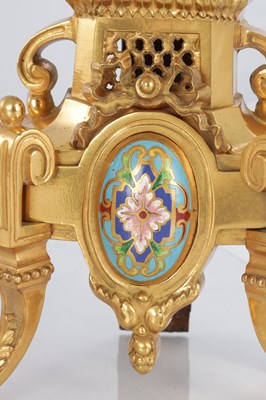 Lot A PAIR OF LATE 19TH CENTURY FRENCH ORMOLU AND CHAMPLEVE ENAMELLED FIRE DOGS