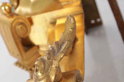 Lot A PAIR OF LATE 19TH CENTURY FRENCH ORMOLU AND CHAMPLEVE ENAMELLED FIRE DOGS