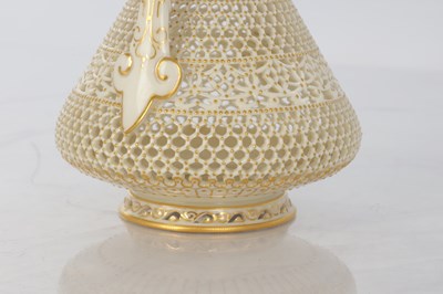 Lot 80 - GEORGE OWEN A FINE ROYAL WORCESTER JEWELLED GILT AND IVORY GROUND TWO-HANDLED FOOTED CABINET VASE