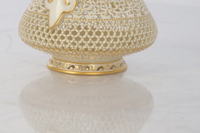 Lot 80 - GEORGE OWEN A FINE ROYAL WORCESTER JEWELLED GILT AND IVORY GROUND TWO-HANDLED FOOTED CABINET VASE